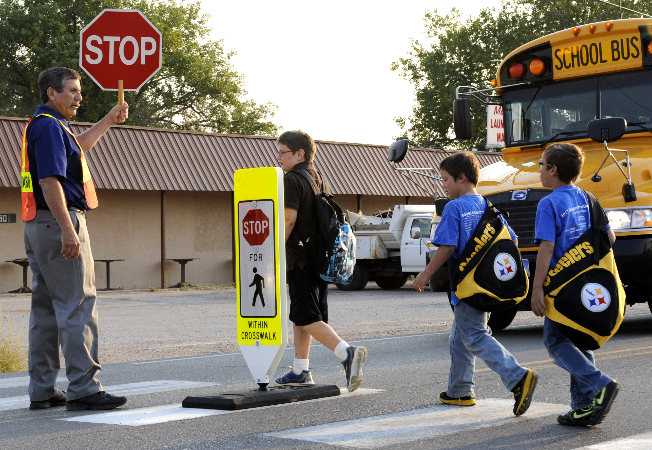 Crossing guard and children