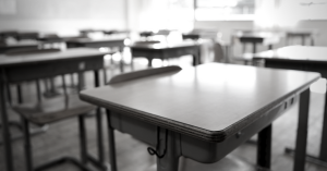 Empty classroom and school desks