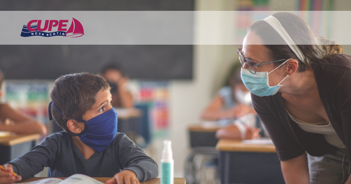 Web banner. Image Teacher talking to young student at his desk. Both are wearing face masks. CUPE NS logo.
